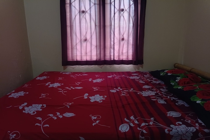 Imagen de la habitación del Hotel OYO 93766 Bunga Homestay. Foto 5