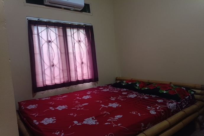 Imagen de la habitación del Hotel OYO 93766 Bunga Homestay. Foto 6