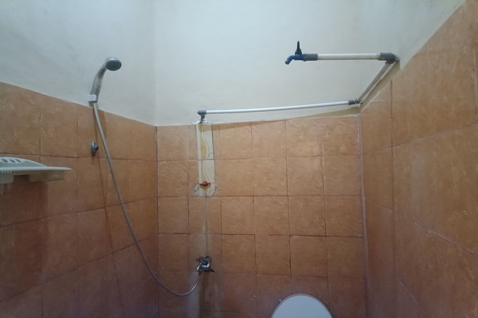 Imagen de la habitación del Hotel OYO 93766 Bunga Homestay. Foto 10
