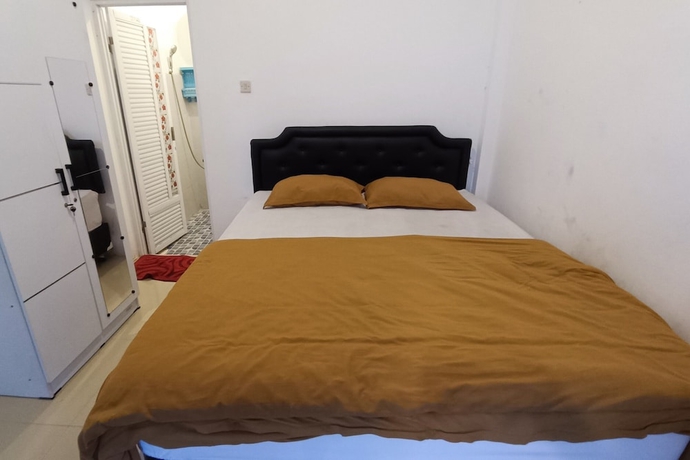Imagen de la habitación del Hotel OYO 93779 Bumi Tenang Homestay. Foto 3