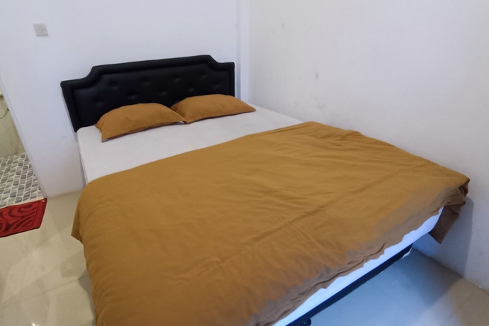 Imagen de la habitación del Hotel OYO 93779 Bumi Tenang Homestay. Foto 4