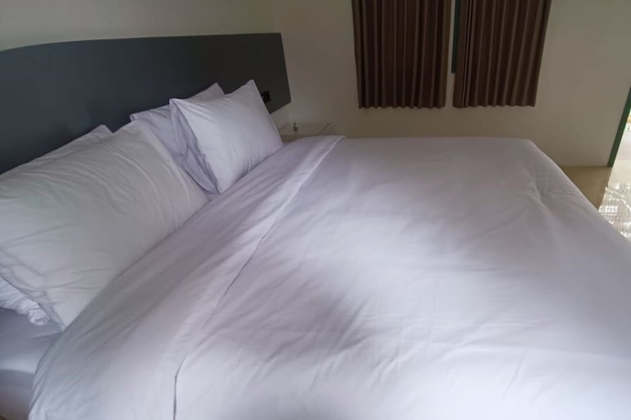 Imagen de la habitación del Hotel OYO 93779 Bumi Tenang Homestay. Foto 9