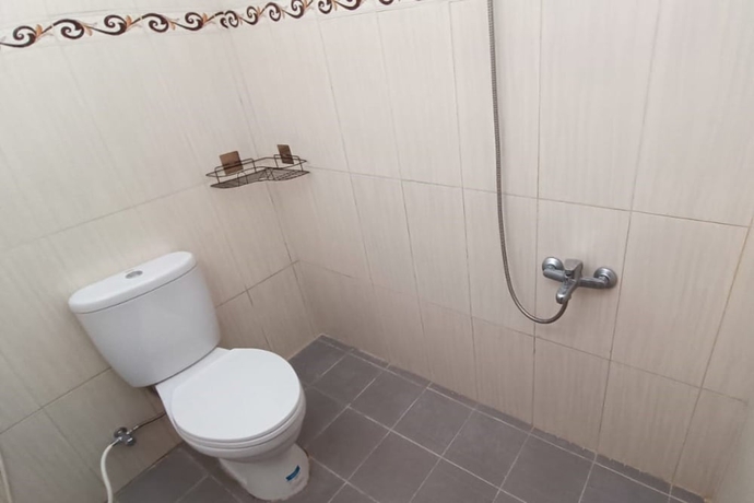 Imagen de la habitación del Hotel OYO 93779 Bumi Tenang Homestay. Foto 14