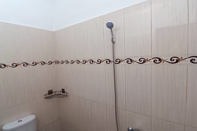 Imagen de la habitación del Hotel OYO 93779 Bumi Tenang Homestay. Foto 15