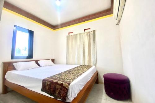 Imagen de la habitación del Hotel OYO 93817 Vera Guesthouse. Foto 20