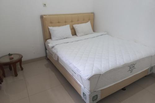 Imagen de la habitación del Hotel OYO 93820 Salma Homestay Syariah. Foto 19