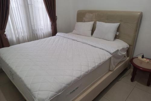 Imagen de la habitación del Hotel OYO 93820 Salma Homestay Syariah. Foto 20