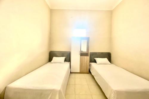 Imagen general del Hotel OYO 93838 Delia Inn Syariah. Foto 5