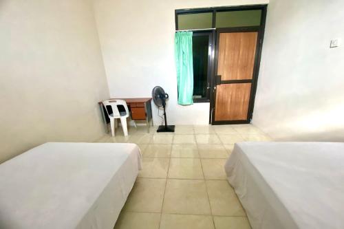 Imagen general del Hotel OYO 93838 Delia Inn Syariah. Foto 9