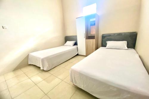 Imagen general del Hotel OYO 93838 Delia Inn Syariah. Foto 10