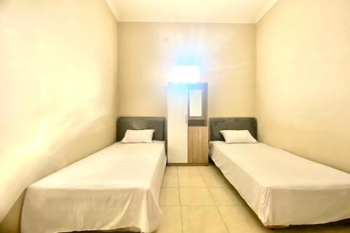 Imagen general del Hotel OYO 93838 Delia Inn Syariah. Foto 12