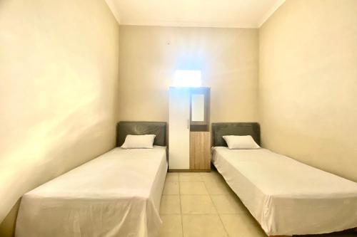 Imagen general del Hotel OYO 93838 Delia Inn Syariah. Foto 14