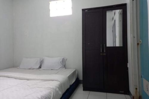 Imagen de la habitación del Hotel OYO 93847 Blio Guest House Syariah. Foto 20