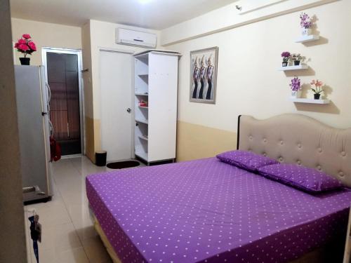 Imagen de la habitación del Hotel OYO 93857 Apartemen Kalibata City By Artomoro. Foto 19
