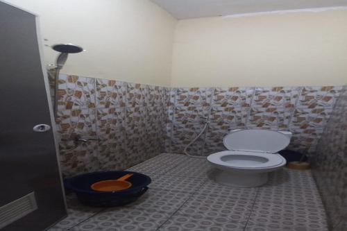Imagen de la habitación del Hotel OYO 93861 Adinda Guest House Syariah. Foto 19