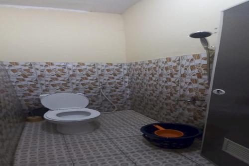 Imagen de la habitación del Hotel OYO 93861 Adinda Guest House Syariah. Foto 20