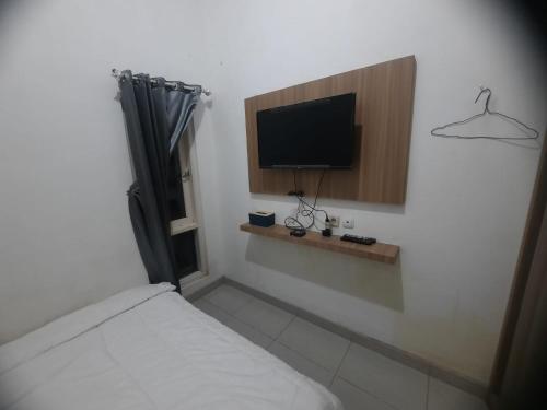 Imagen general del Hotel OYO 93870 Damai Guest House Cirebon. Foto 12