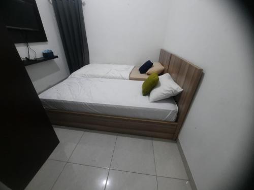 Imagen de la habitación del Hotel OYO 93870 Damai Guest House Cirebon. Foto 20