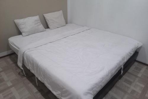Imagen de la habitación del Hotel OYO 93892 Homestay Koe Syariah. Foto 19