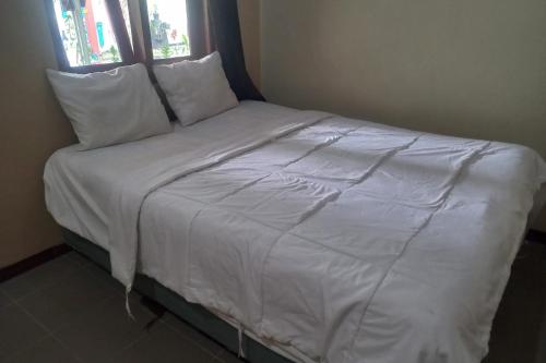 Imagen de la habitación del Hotel OYO 93892 Homestay Koe Syariah. Foto 20