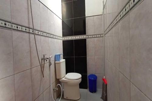 Imagen de la habitación del Hotel OYO 93963 Homestay Kita Purworejo. Foto 19