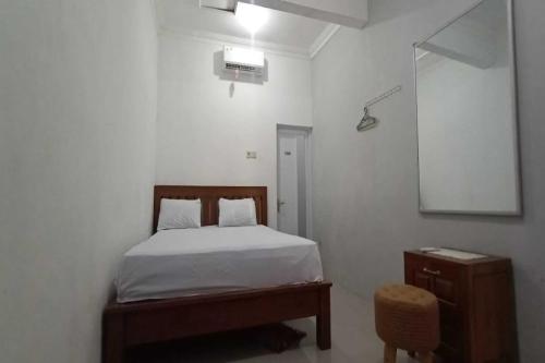 Imagen de la habitación del Hotel OYO 93963 Homestay Kita Purworejo. Foto 20