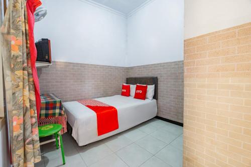 Imagen de la habitación del Hotel OYO 93976 Maluku Guest House. Foto 18