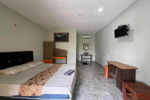 Imagen de la habitación del Hotel OYO 94014 The Sanya Homestay. Foto 18