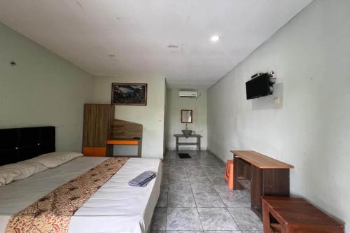Imagen de la habitación del Hotel OYO 94014 The Sanya Homestay. Foto 19