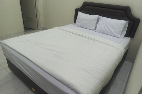 Imagen de la habitación del Hotel OYO 94019 Syariah Griya Wisata. Foto 20