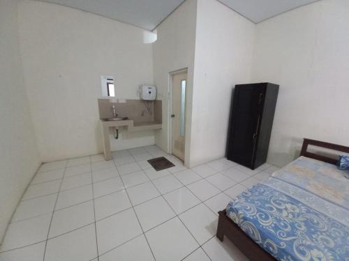 Imagen general del Hotel OYO 94034 Perbetulan Guest House Syariah. Foto 8