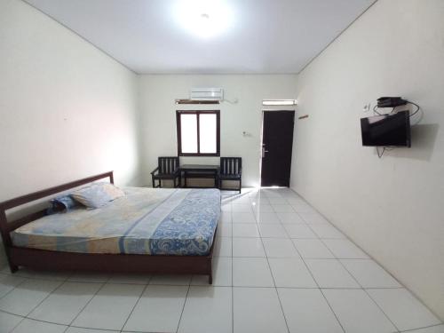 Imagen general del Hotel OYO 94034 Perbetulan Guest House Syariah. Foto 10