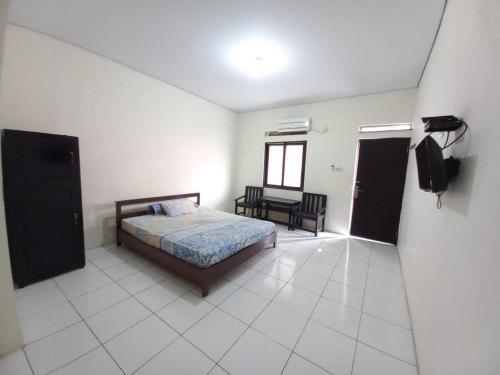 Imagen general del Hotel OYO 94034 Perbetulan Guest House Syariah. Foto 11