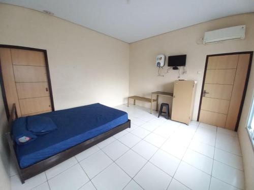 Imagen general del Hotel OYO 94034 Perbetulan Guest House Syariah. Foto 12