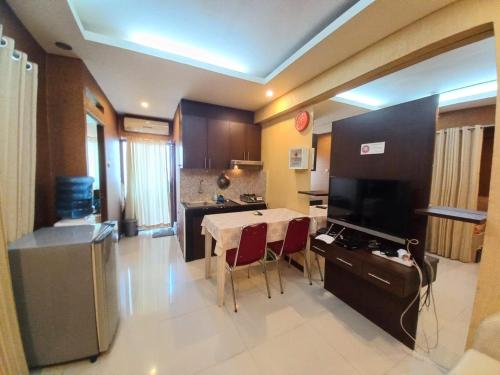 Imagen general del Hotel OYO 94052 Apartement Gateway Cicadas by Guling Property. Foto 7