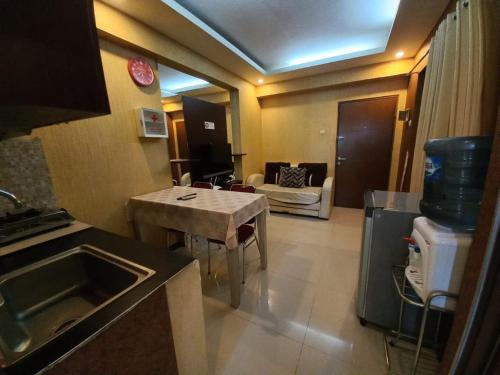 Imagen general del Hotel OYO 94052 Apartement Gateway Cicadas by Guling Property. Foto 8