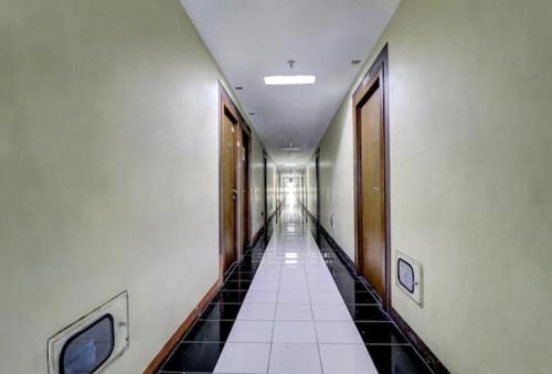 Imagen general del Hotel OYO 94052 Apartement Gateway Cicadas by Guling Property. Foto 13