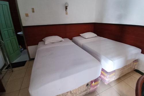 Imagen general del Hotel OYO 94082 Gurita. Foto 12