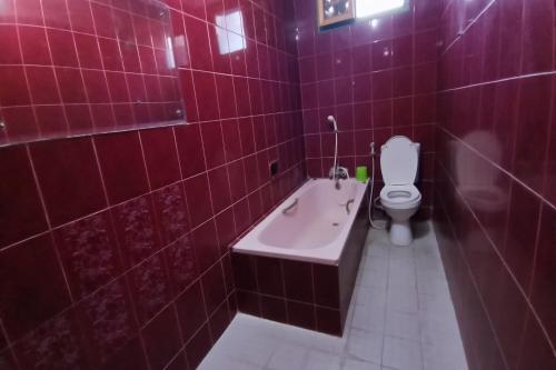 Imagen general del Hotel OYO 94082 Gurita. Foto 15