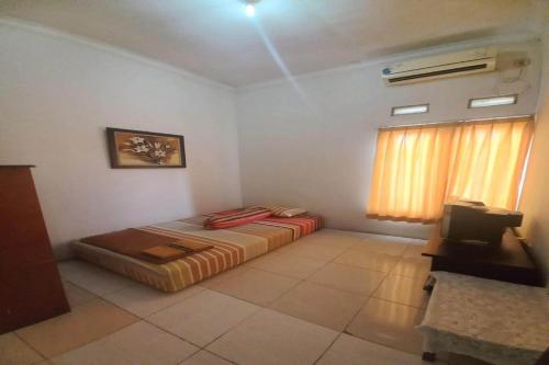 Imagen general del Hotel OYO 94102 Kuningan Guest House Syariah. Foto 17