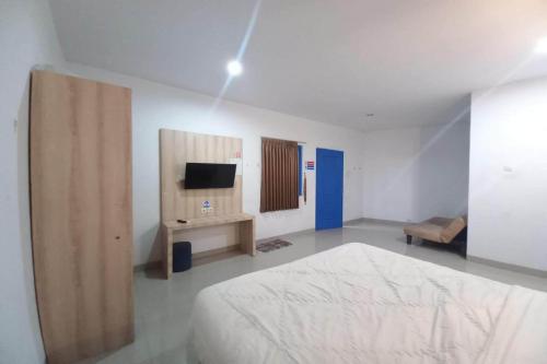 Imagen de la habitación del Hotel OYO 94103 Sandy Residence Ii. Foto 19