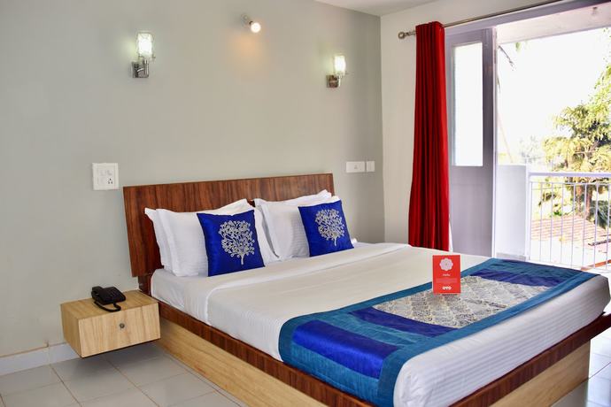 Imagen de la habitación del Hotel OYO 9411 Resort Calangute. Foto 1