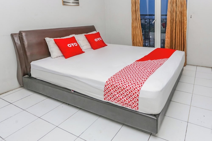 Imagen de la habitación del Hotel OYO 94117 Mr Rooms Appartement Mutiara. Foto 2