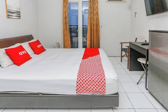 Imagen de la habitación del Hotel OYO 94117 Mr Rooms Appartement Mutiara. Foto 4