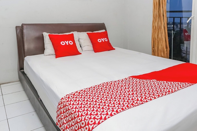 Imagen de la habitación del Hotel OYO 94117 Mr Rooms Appartement Mutiara. Foto 5
