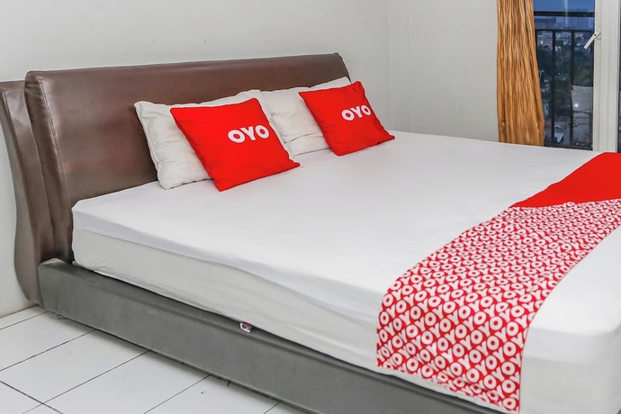 Imagen de la habitación del Hotel OYO 94117 Mr Rooms Appartement Mutiara. Foto 8