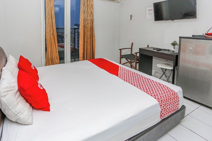 Imagen de la habitación del Hotel OYO 94117 Mr Rooms Appartement Mutiara. Foto 10