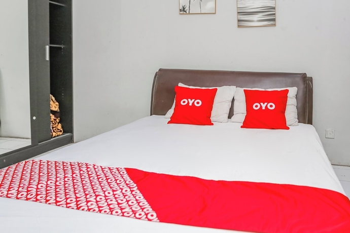 Imagen de la habitación del Hotel OYO 94117 Mr Rooms Appartement Mutiara. Foto 11