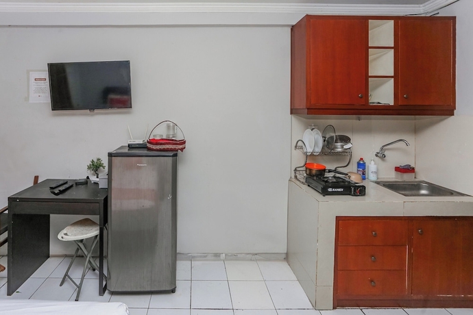 Imagen de la habitación del Hotel OYO 94117 Mr Rooms Appartement Mutiara. Foto 13