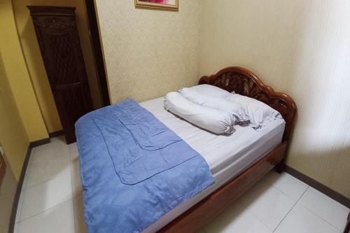 Imagen de la habitación del Hotel OYO 94120 Penginapan Viki Syariah. Foto 19